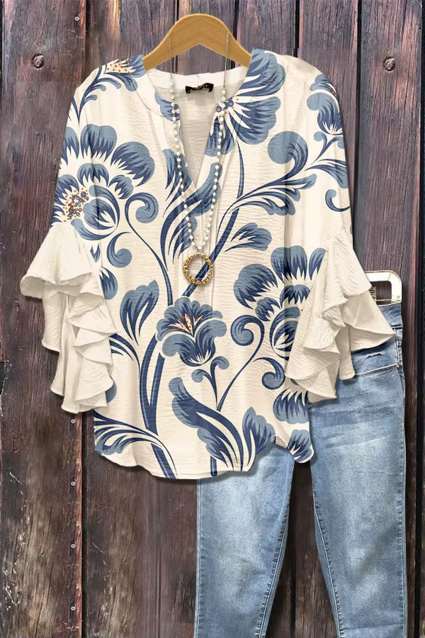 Elegant Damebluse med Kunstnerisk Print og Flæseærmer