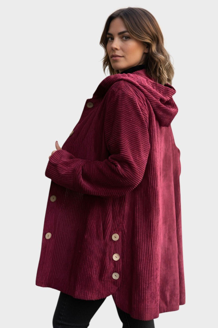 Afslappet oversize damejakke med hætte, perfekt til hverdag og fritid. Stilfuld og komfortabel overgangsjakke for kvinder.