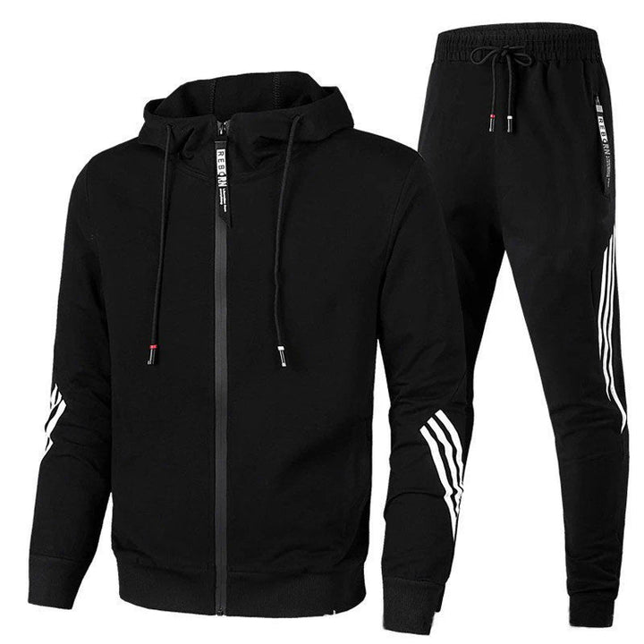 Alsidig træningsdragt i blødt, elastisk materiale med sporty look, ideel til både træning og afslapning i flere farver.