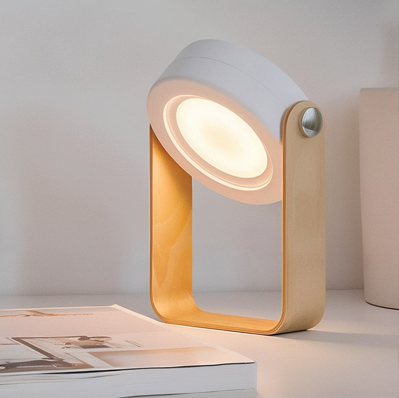 Bærbar, dæmpbar LED-lampe med trådløs funktion og USB-opladning for fleksibel belysning.