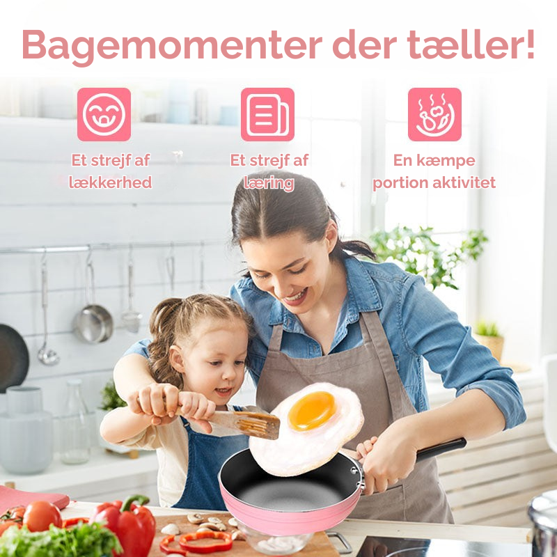 Nært billede af silikone kagerulle og spatel fra børnekokkesæt, designet til små kokkehænder.
