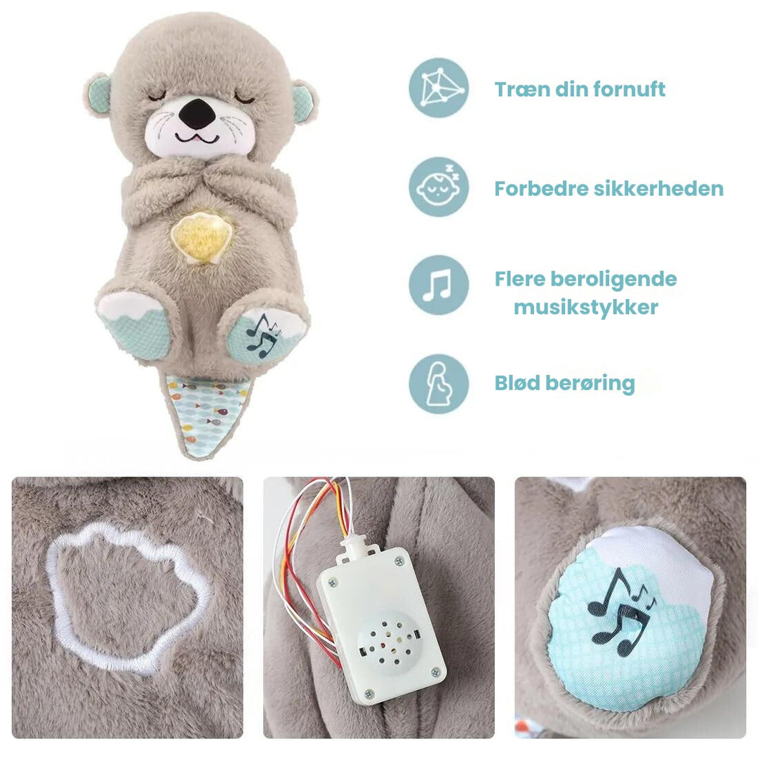 Sødt plysdyr odder der hjælper baby med at falde i søvn. Perfekt til nyfødte.