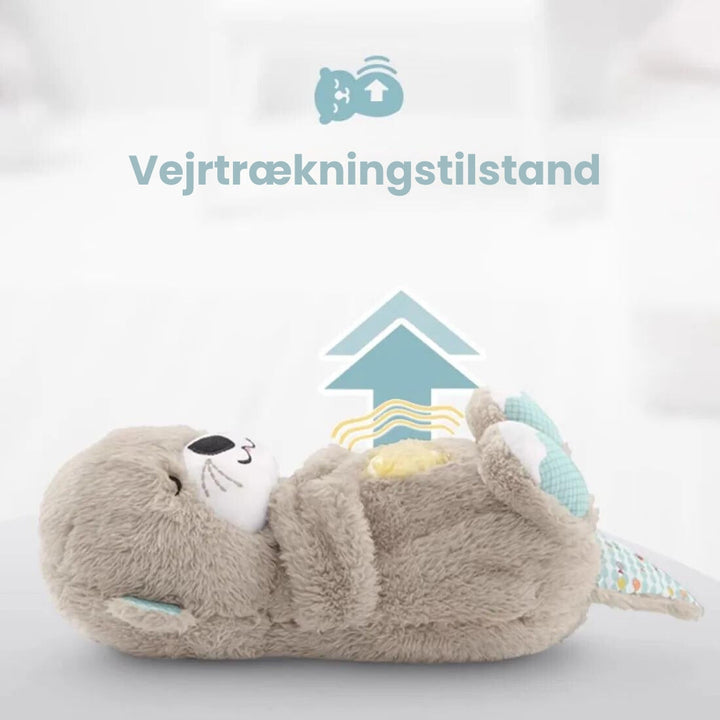 Beroligende sovehjælp: Odder nussebamse med åndedrætsbevægelser for rolig søvn.