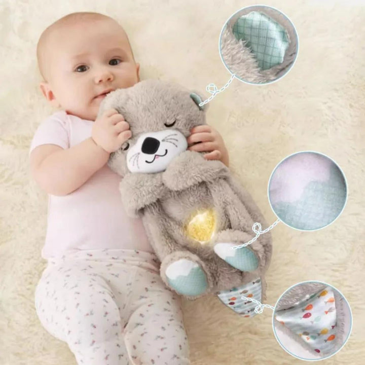 Gave til baby: Blød odder nussebamse der skaber tryghed og hygge ved sengetid.
