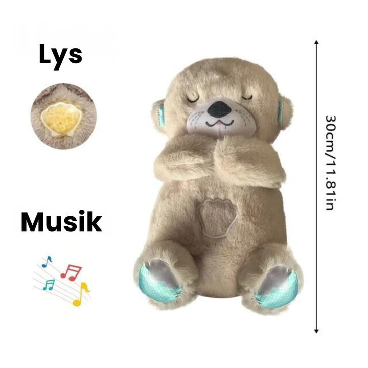 Rolig søvn med odder nussebamse. Interaktiv sovehjælp til babyer og småbørn.