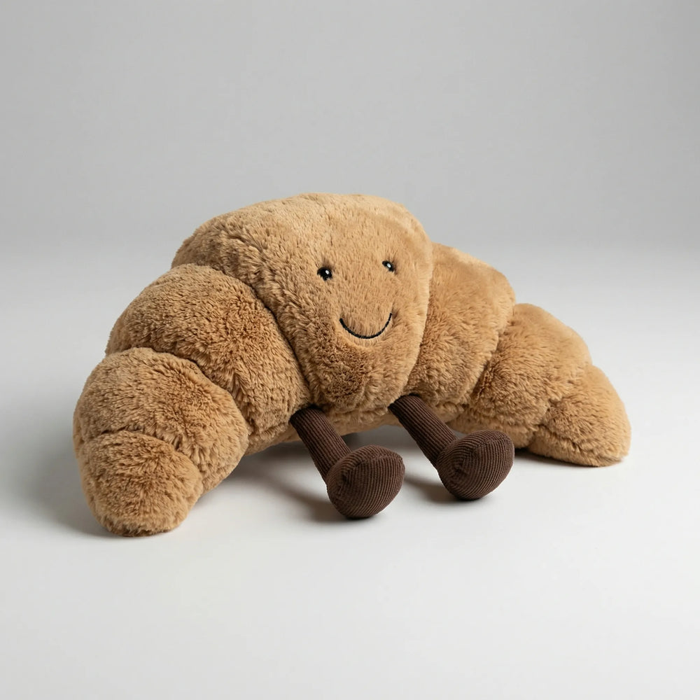 Plysdyr: Brun croissant krammebamse, utrolig blød og klar til masser af kram.