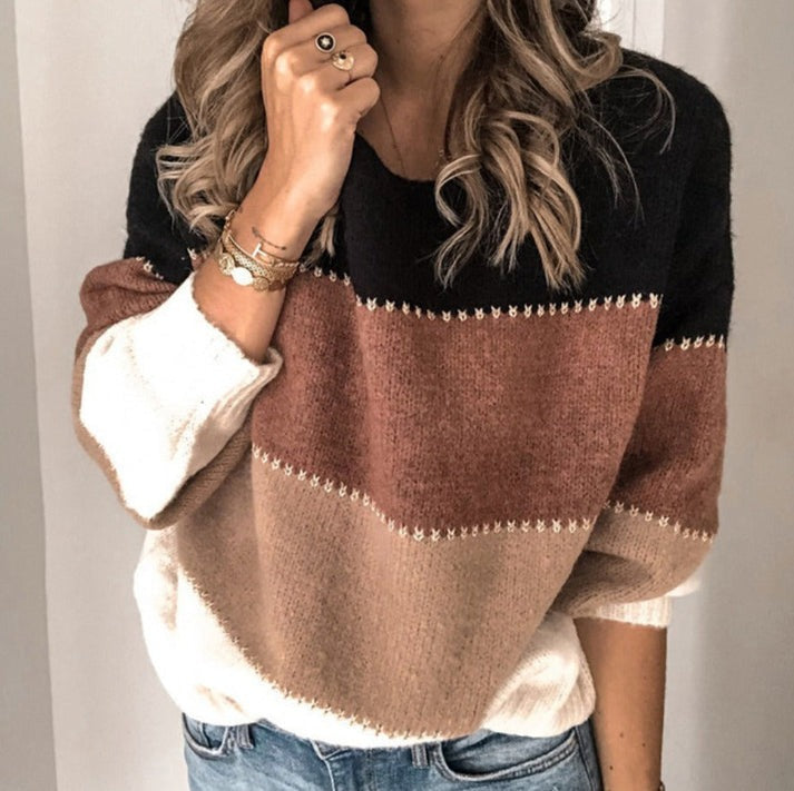 Stilfuld stribet dametrøje til kvinder. Alsidig og farverig pullover for en moderne, afslappet stil.