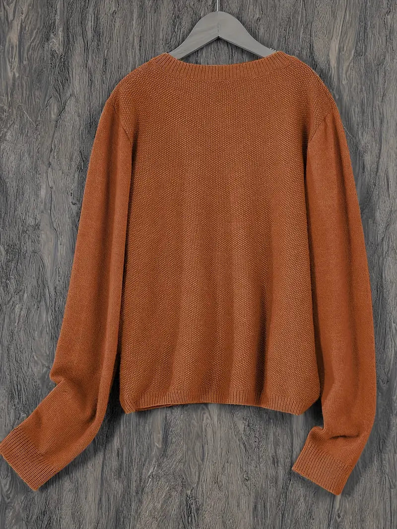 "Blød oversized uld strikcardigan til kvinder, elegant og komfortabel med afslappet pasform og praktiske lommer."