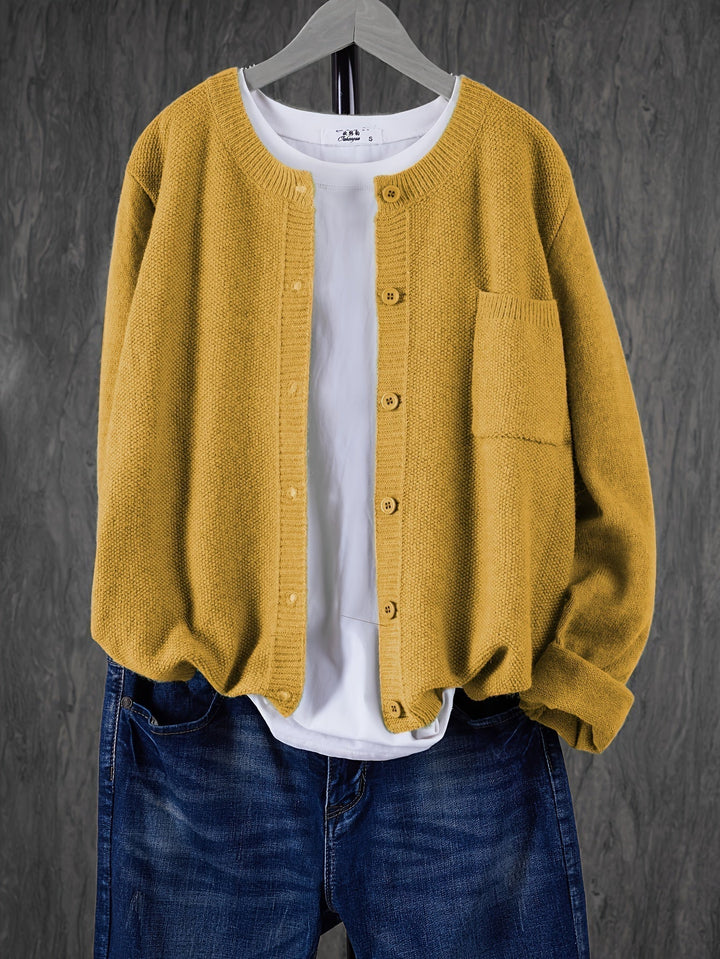 "Blød oversized uld strikcardigan til kvinder, elegant og komfortabel med afslappet pasform og praktiske lommer."
