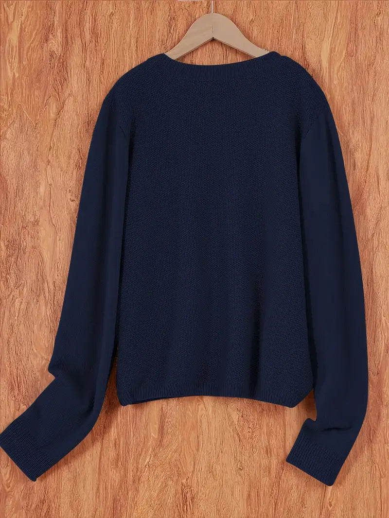 "Blød oversized uld strikcardigan til kvinder, elegant og komfortabel med afslappet pasform og praktiske lommer."