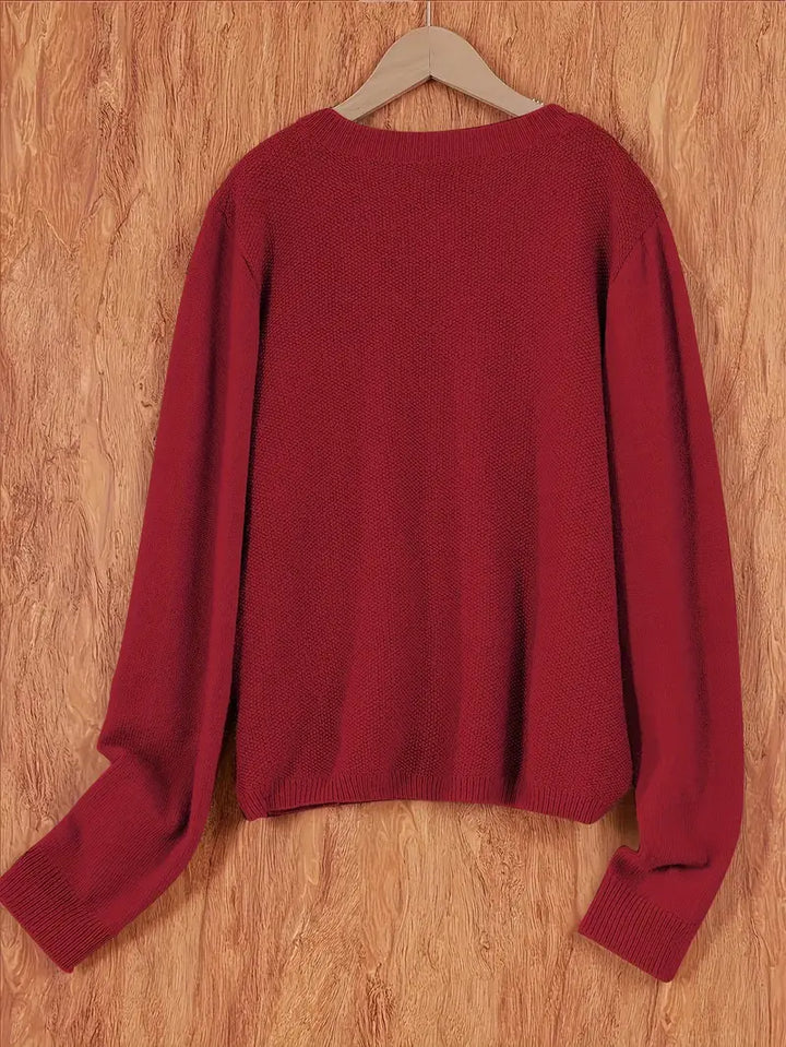 "Blød oversized uld strikcardigan til kvinder, elegant og komfortabel med afslappet pasform og praktiske lommer."