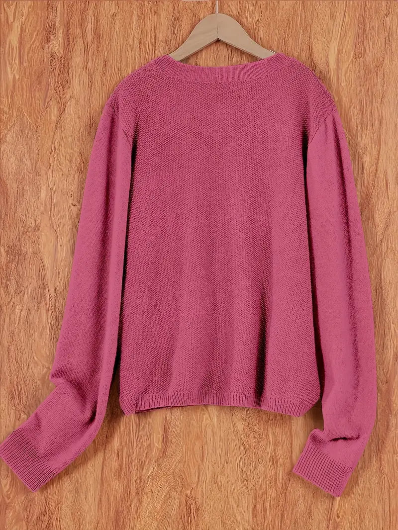 "Blød oversized uld strikcardigan til kvinder, elegant og komfortabel med afslappet pasform og praktiske lommer."