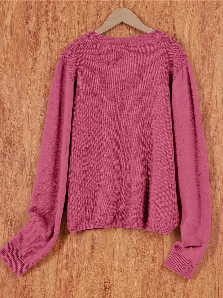 "Blød oversized uld strikcardigan til kvinder, elegant og komfortabel med afslappet pasform og praktiske lommer."