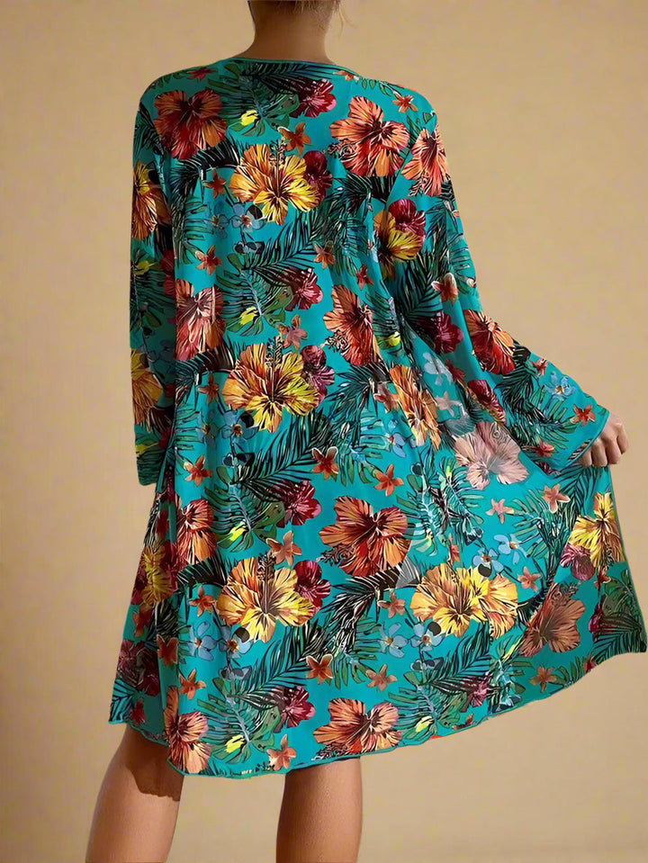 Elegant badetøjssæt til kvinder med blomsterprint badedragt og løst cover-up. Perfekt til pool og strand.