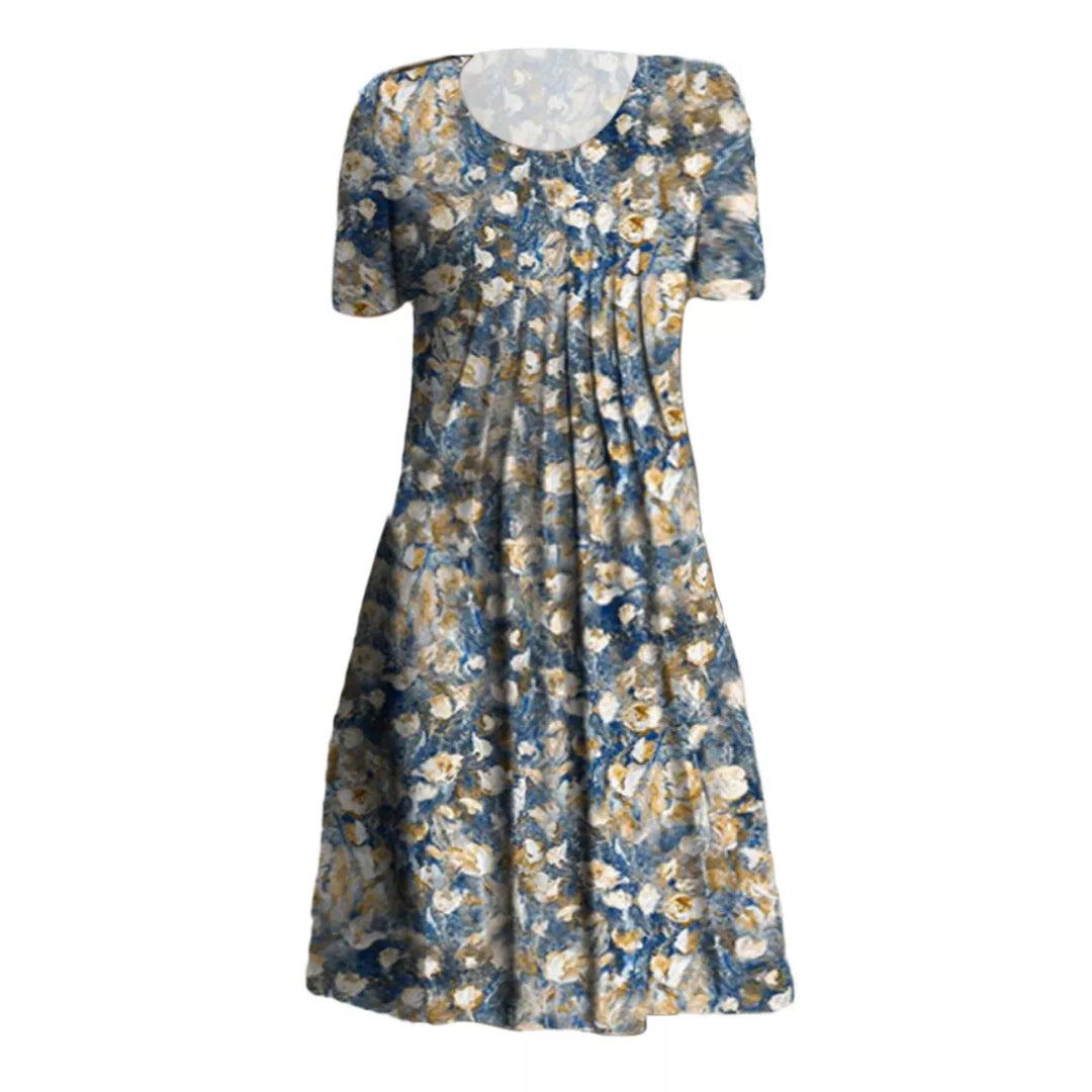 "Blomstret sommer midi kjole, let stof, afslappet pasform, lommer, feminint design, perfekt til varme dage"