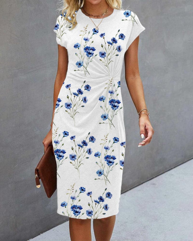 Blomstret sommerkjole med feminint blomsterprint, letvægtsmateriale, flatterende pasform for unik og elegant stil.