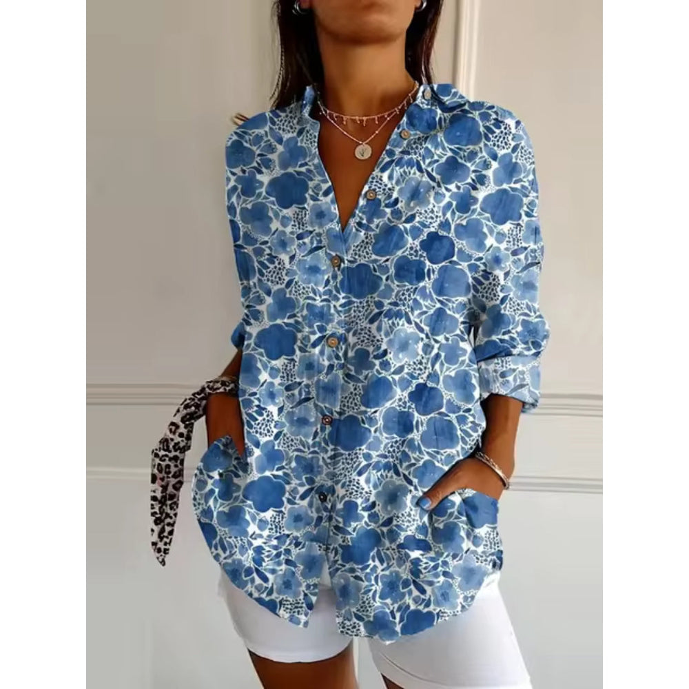 Smuk langærmet bohemebluse med levende blomsterprint, perfekt til forår og sommer. Komfortabel pasform.