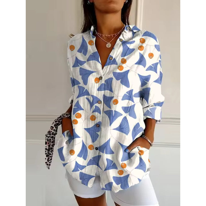 Boho stil langærmet damebluse med detaljeret blomsterprint. En farverig og afslappet V-hals top til hverdagsbrug.