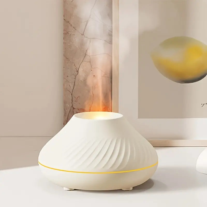 Elegant CalmMist aroma diffuser med hyggelig flammeeffekt og stemningslys for afslapning i hjemmet.