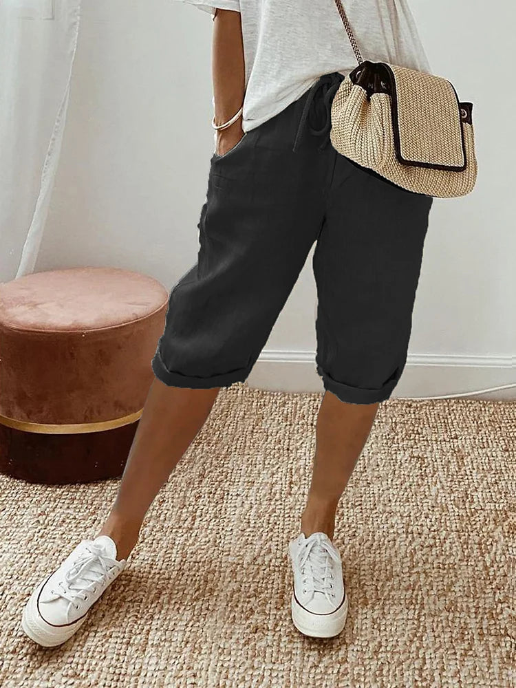"Casual kvinders shorts i let bomuld med sidelommer og elastisk talje, afslappet pasform til varme sommerdage"