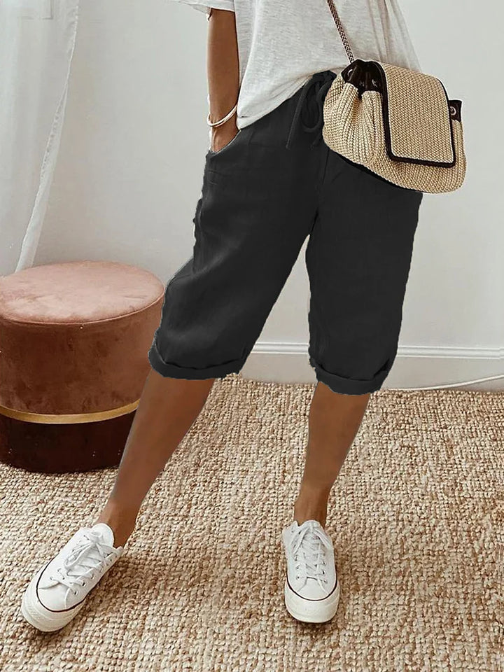"Casual kvinders shorts i let bomuld med sidelommer og elastisk talje, afslappet pasform til varme sommerdage"