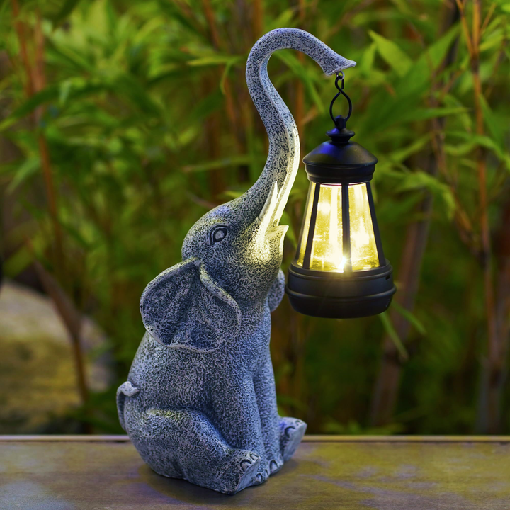 Energibesparende elefant solarlampe i harpiks med automatisk tænding, perfekt til terrasse og have.