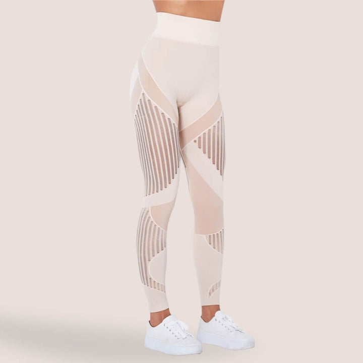 Dame anti-cellulite leggings i sort, der formgiver og glatter huden. Perfekt til træning og fritid.
