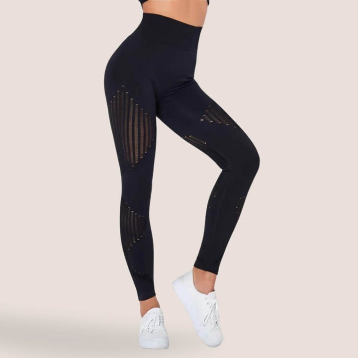 Detalje af den bløde og strækbare stofkvalitet i vores anti-cellulite leggings for maksimal komfort.