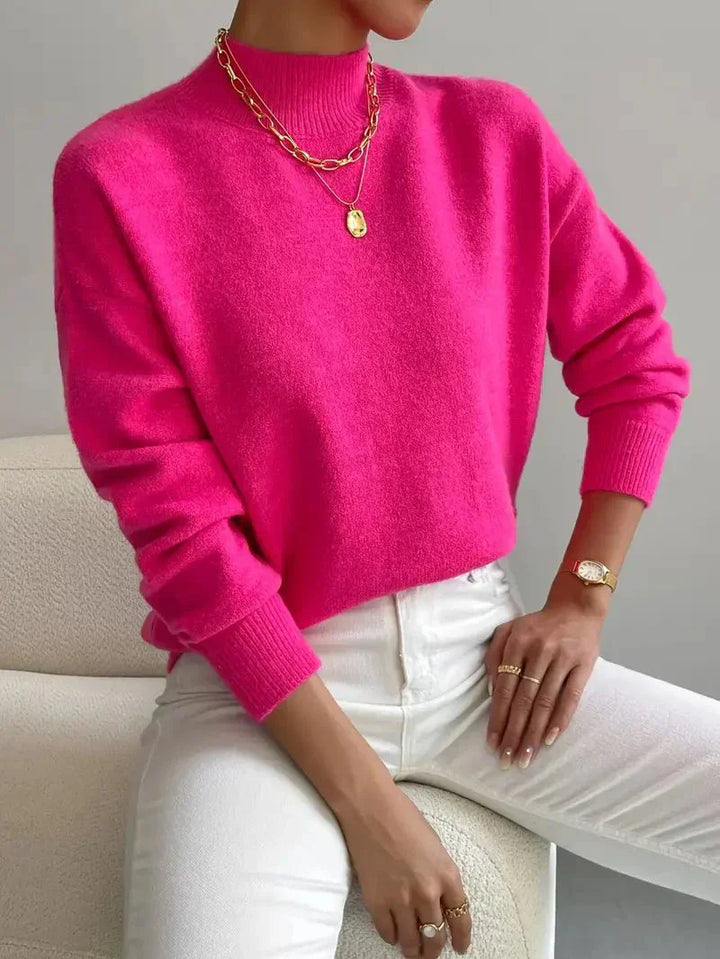 Stilren dame striktrøje med rund hals. Komfortabel basis sweater, der kombinerer elegance med hverdagsbehag.