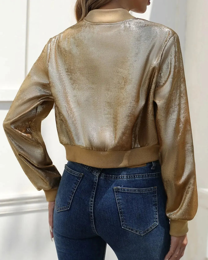 Metallisk guld dame bomberjakke, et fashion statement. Trendy overtøj for et eksklusivt og festligt look.