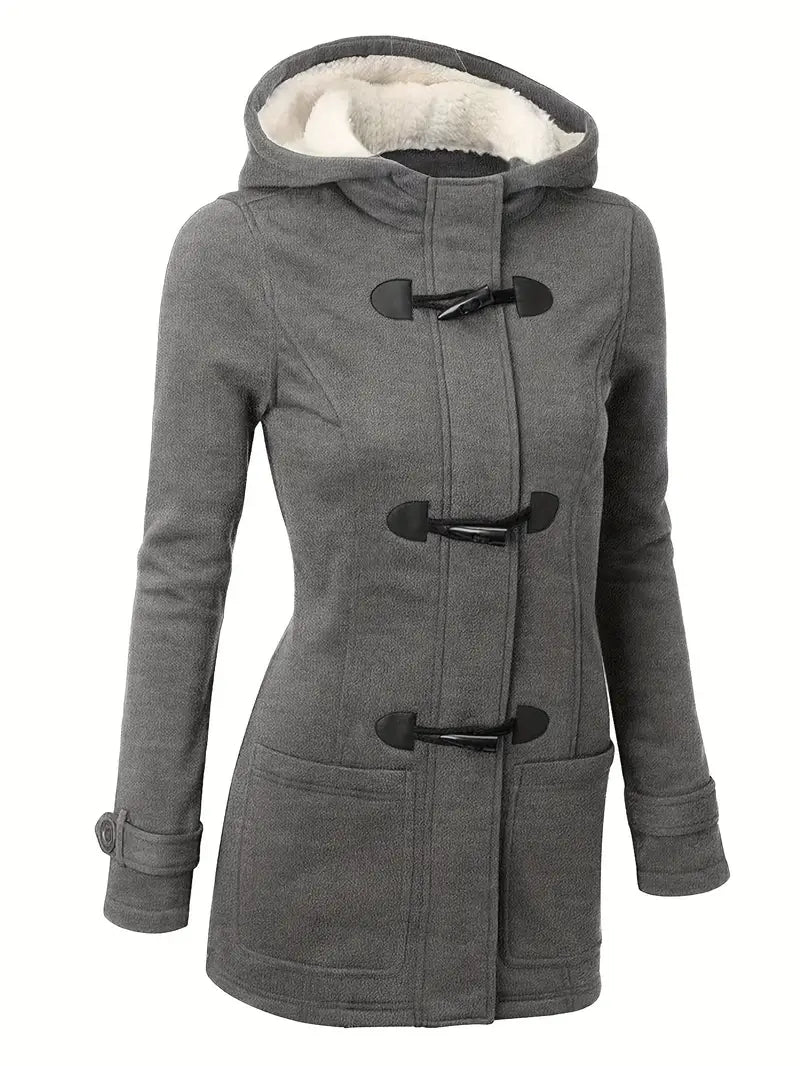 Varm dame duffelcoat med hætte. En modebevidst og komfortabel vinterfrakke, ideel til koldt vejr.
