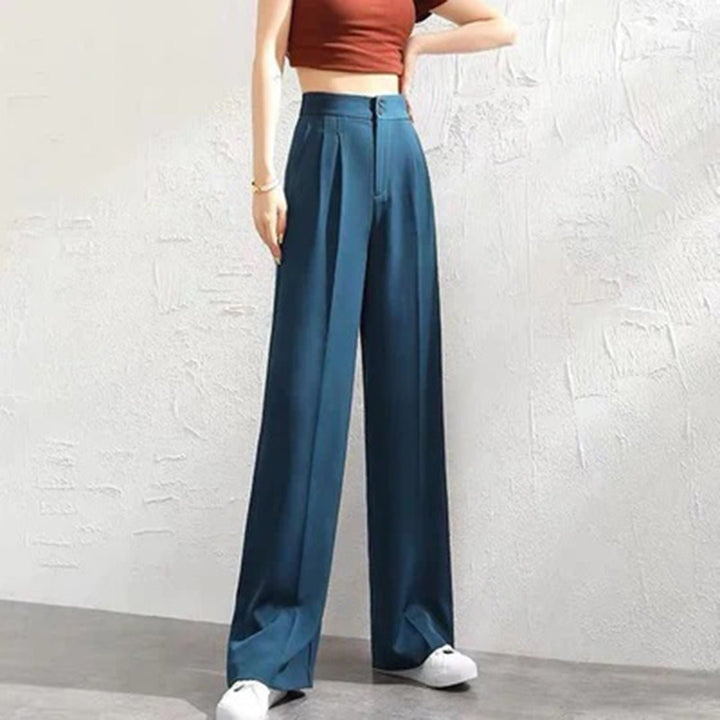 Elegante højtaljede damebukser i linned med vide ben. Feminine og åndbare sommerbukser til stilfuld komfort.