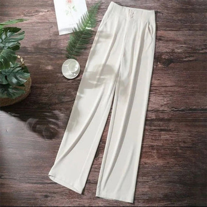 Åndbare vide linnedbukser til dame. Højtaljede for en flatterende pasform og elegant, casual look.