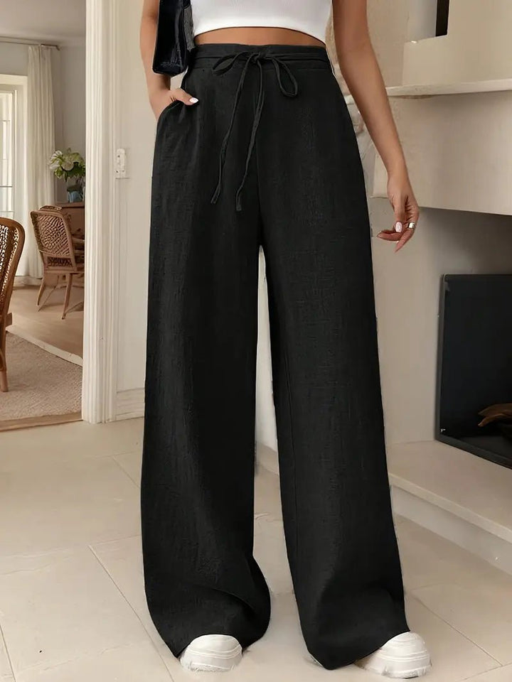 Løse dame hør wide leg bukser, højtaljede. Ideelle som sommerbukser for komfort & stil.