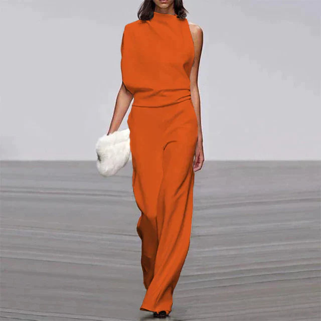 "Dame jumpsuit i elegant, ærmeløst design med let, luftig pasform. Perfekt til sommeranledninger og stilfulde udtryk."
