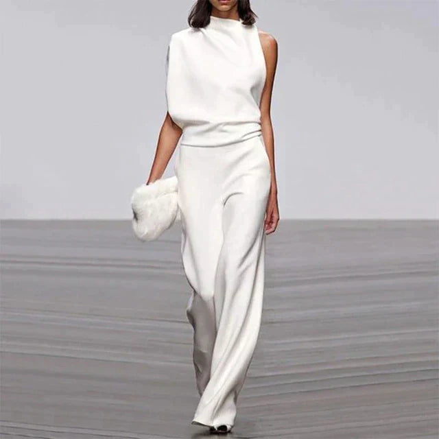 "Dame jumpsuit i elegant, ærmeløst design med let, luftig pasform. Perfekt til sommeranledninger og stilfulde udtryk."