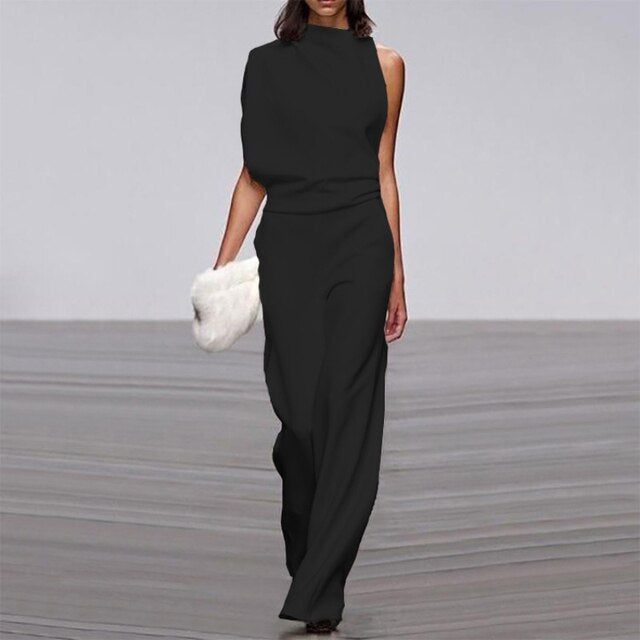 "Dame jumpsuit i elegant, ærmeløst design med let, luftig pasform. Perfekt til sommeranledninger og stilfulde udtryk."