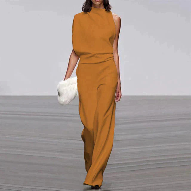 "Dame jumpsuit i elegant, ærmeløst design med let, luftig pasform. Perfekt til sommeranledninger og stilfulde udtryk."