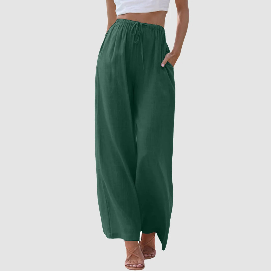 Dame løse sommerbukser med elastisk talje og brede ben for komfortabel, elegant hverdagsstil.