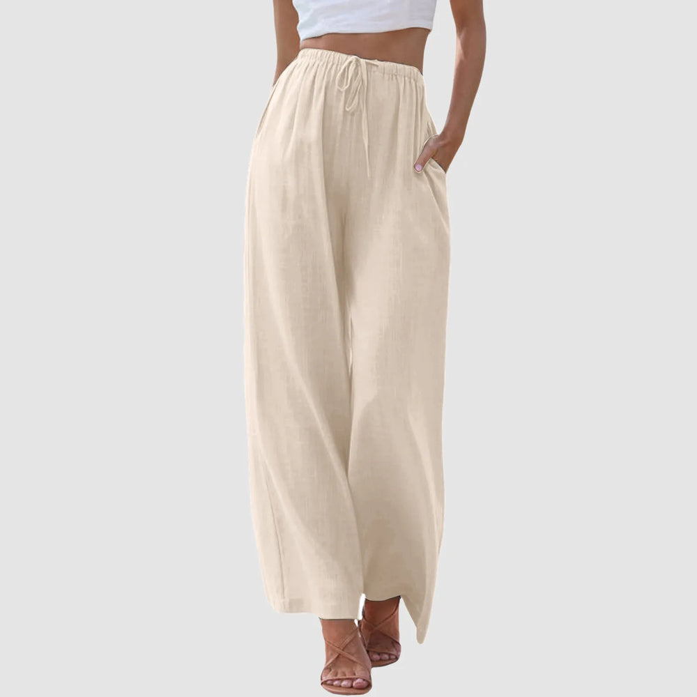 Elegante damebukser til sommer, med løs pasform og elastisk talje. Perfekte til ferie og afslappet mode.