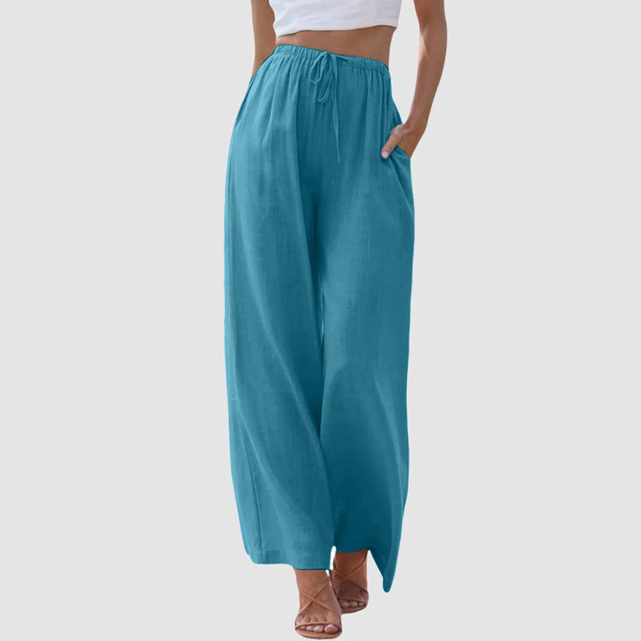 Elegante løse dame sommerbukser med elastisk talje. Alsidige og åndbare til både ferie og hverdagsbrug.