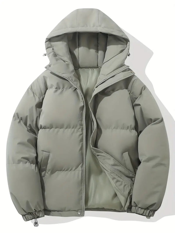 Bagfra: Komfortabel dame vinter dunjakke med hætte, designet til stil og varme.
