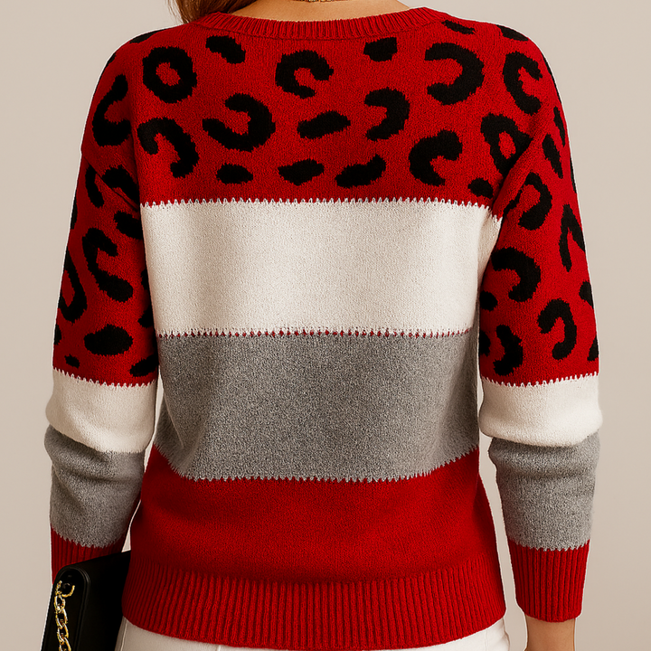 Dame striktrøje i leopard og farveblok. Komfortabel rund hals sweater til efterårs- og vintergarderoben.