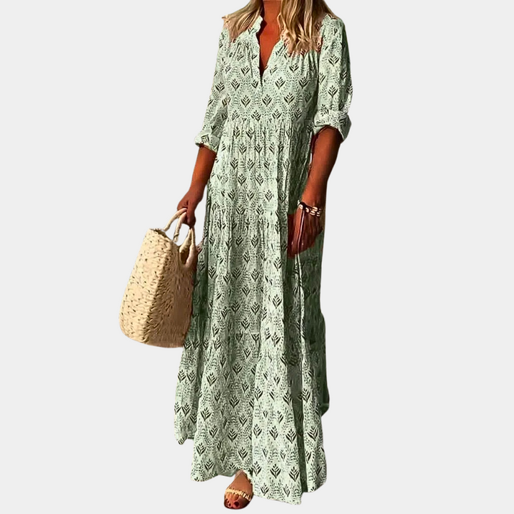 "Dame maxi kjole blå med V-hals og 3/4 ærmer, let materiale, perfekt til sommer og forår, afslappet stil."