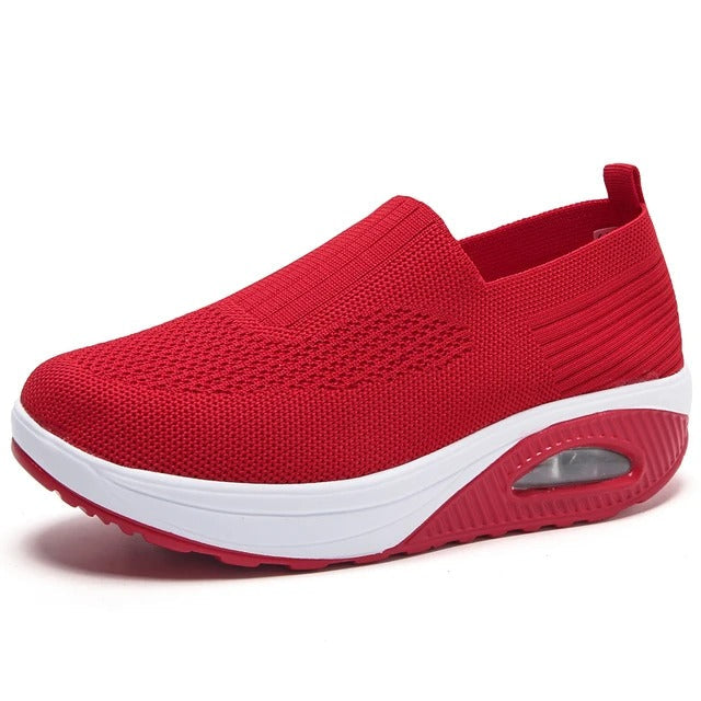 Damesko med indbygget svangstøtte for optimal fodstøtte og lindring af plantar fasciitis.