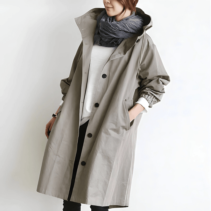Dame oversized hættet frakke med knapper, perfekt til komfort og stil i efteråret/vinteren.