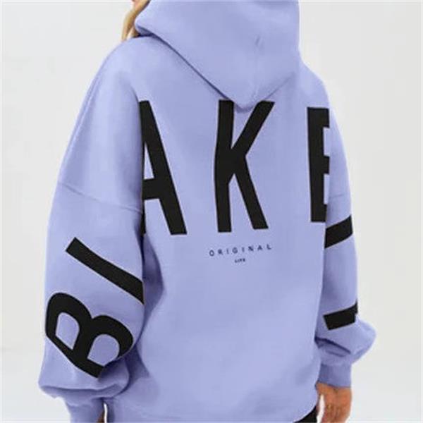 Stilfuld oversized damehættetrøje med et fedt grafisk mønster, perfekt for et trendy og afslappet look.