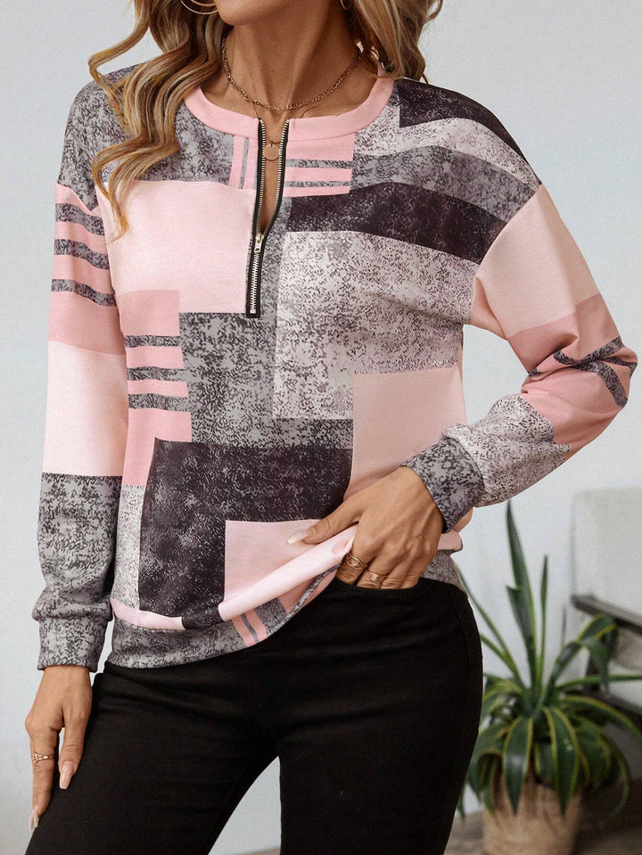 Dame patchwork bluse med lynlås, langærmet og komfortabel til en moderne hverdagsstil.