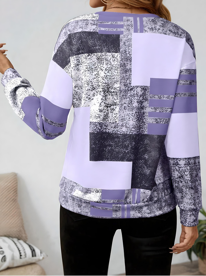 Alsidig dame patchwork lynlåsbluse, ideel til casual og moderne hverdagsgarderobe.