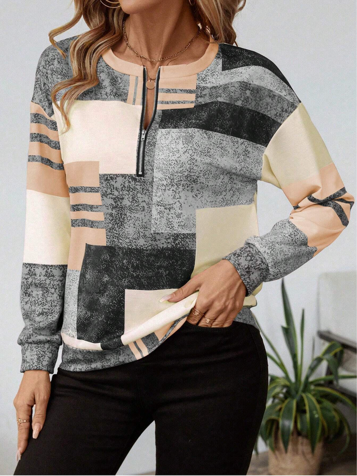 Dame patchwork lynlåsbluse i afslappet pasform, langærmet til casual hverdagsbrug.